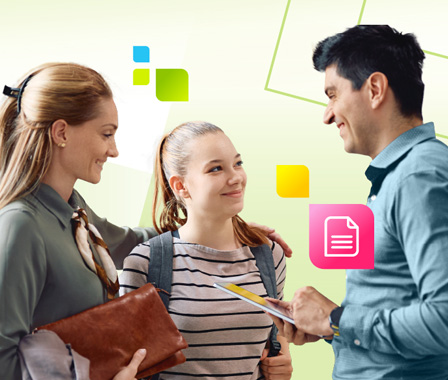 Lehrer spricht mit Schülerinnen.